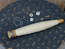 Bobbin with Cream Thread/Yarn-bobbins, thread, yarn