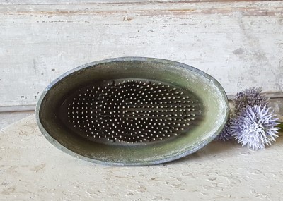 Oval Cast Iron Spike Flower Frog